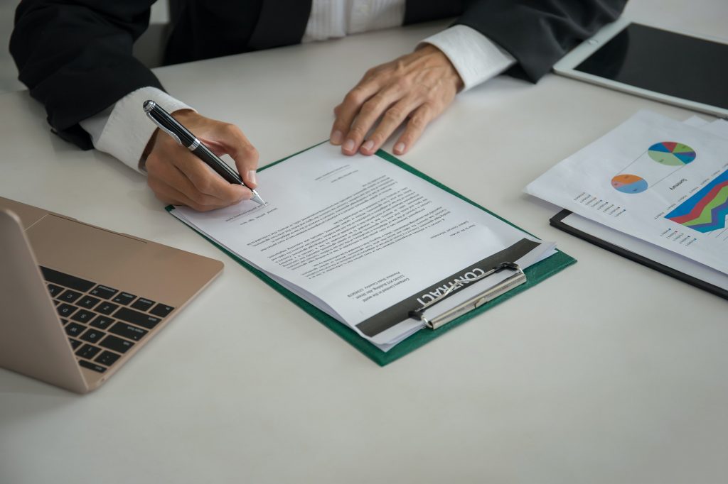 Businessman is signing a partnership contract, Business connection concept.